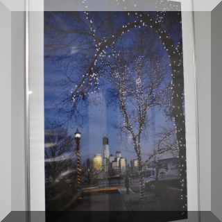 A13. Framed poster “City at Christmas Time”. 24”h x 17”w - $16